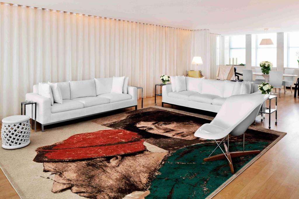 Large white sofas, white chair, white curtains, and decorative rug in living area in the Penthouse at Sanderson London