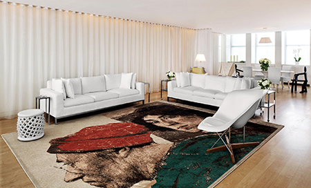 Living area with white sofas, white chair, white curtains, and large rug with portraits on it