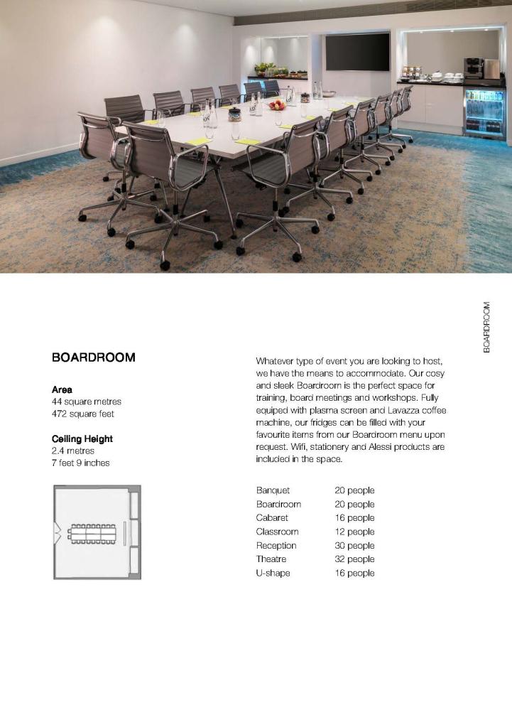 Brochure page with image on top of rectangular table, chairs, and large screen in a conference room and text at the bottom