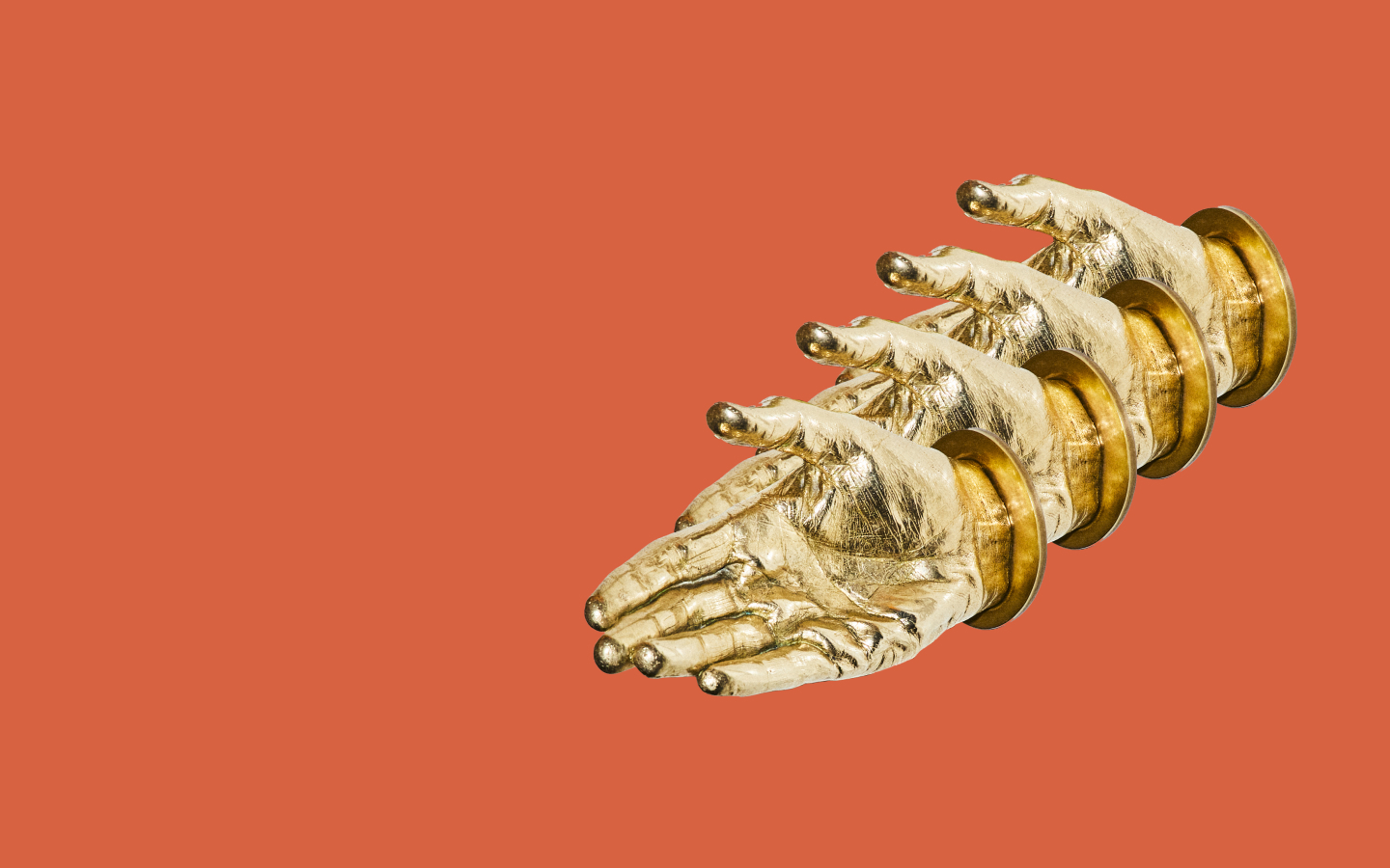 Repeating golden hand on an orange background
