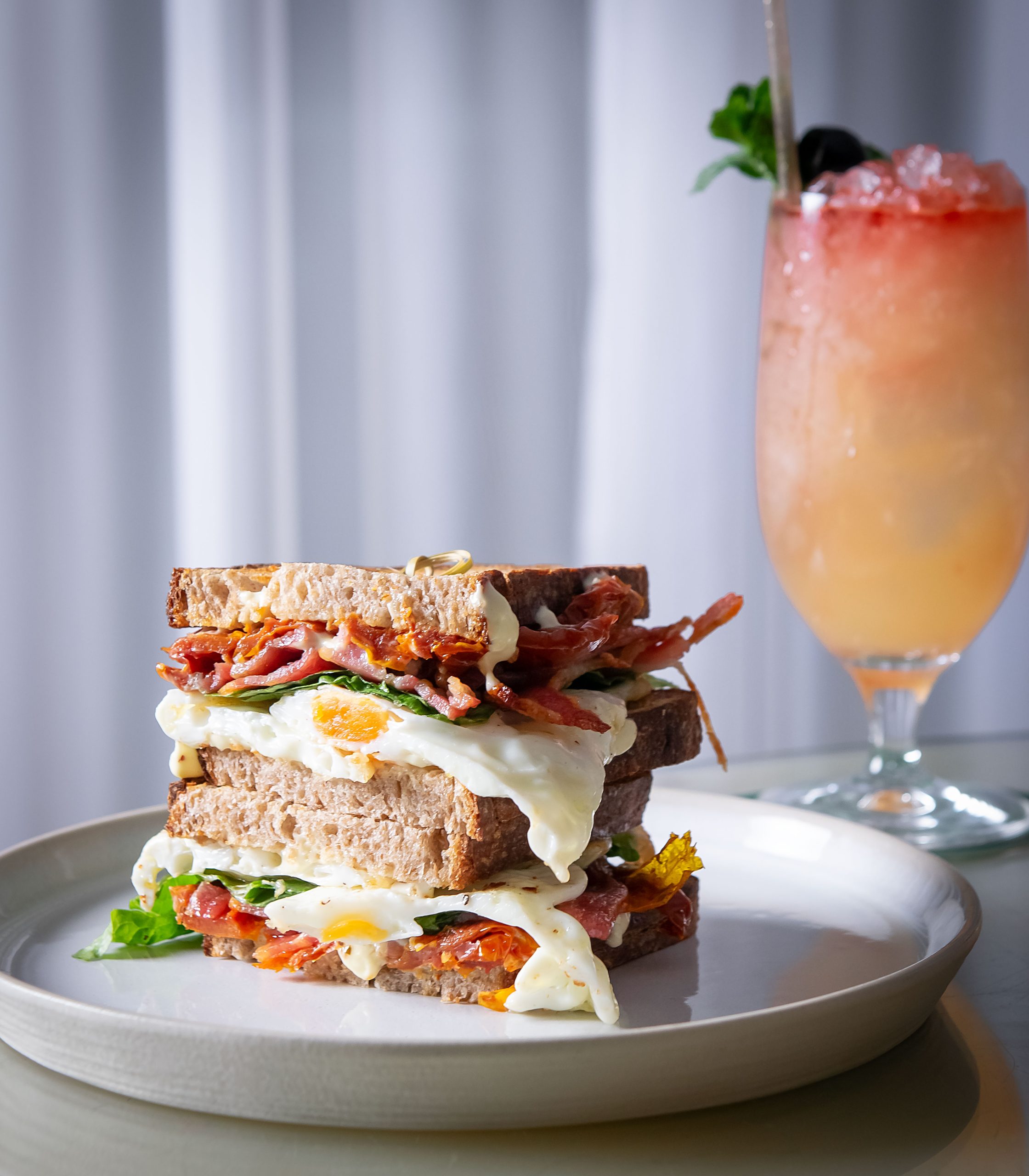 Club sandwich and cocktail