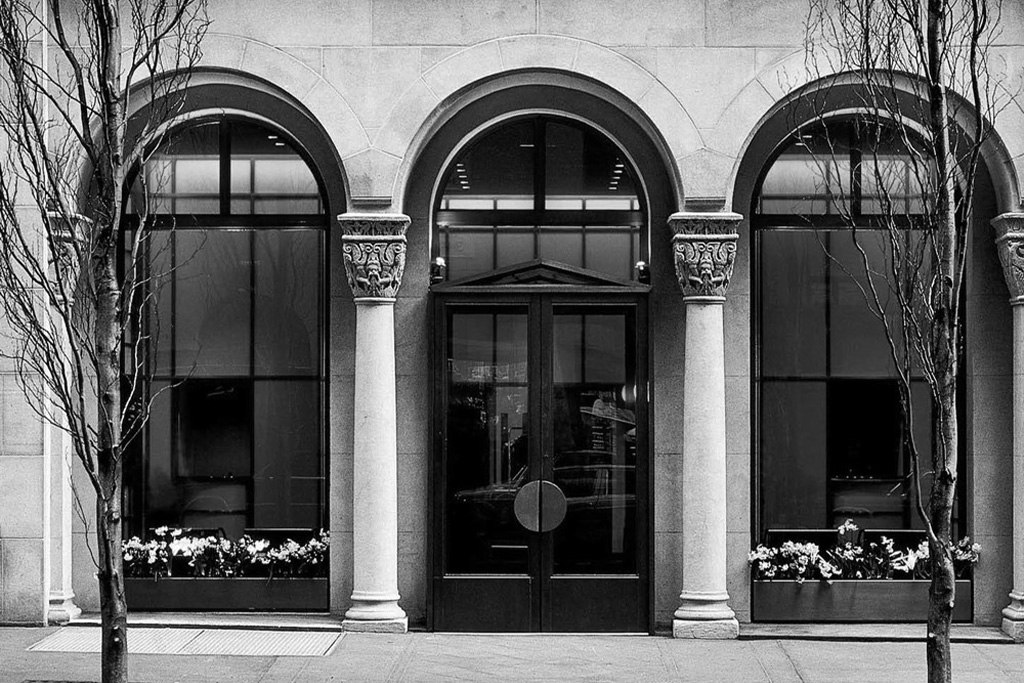 Large grand entrance of Morgan Original Hotel, photo in black and white