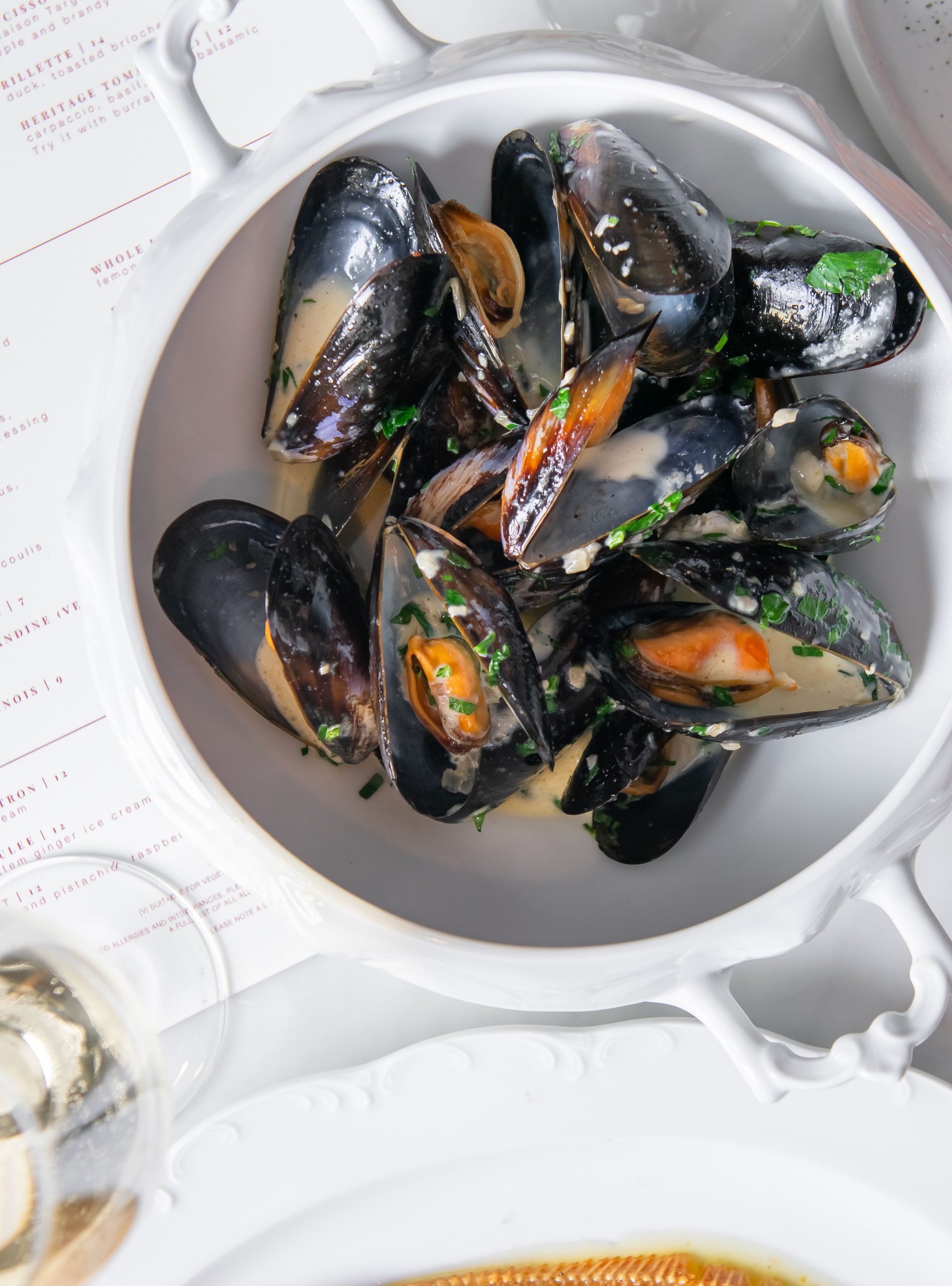 Summer Menu French Inspired at the Restaurant. Mussels. Moules.