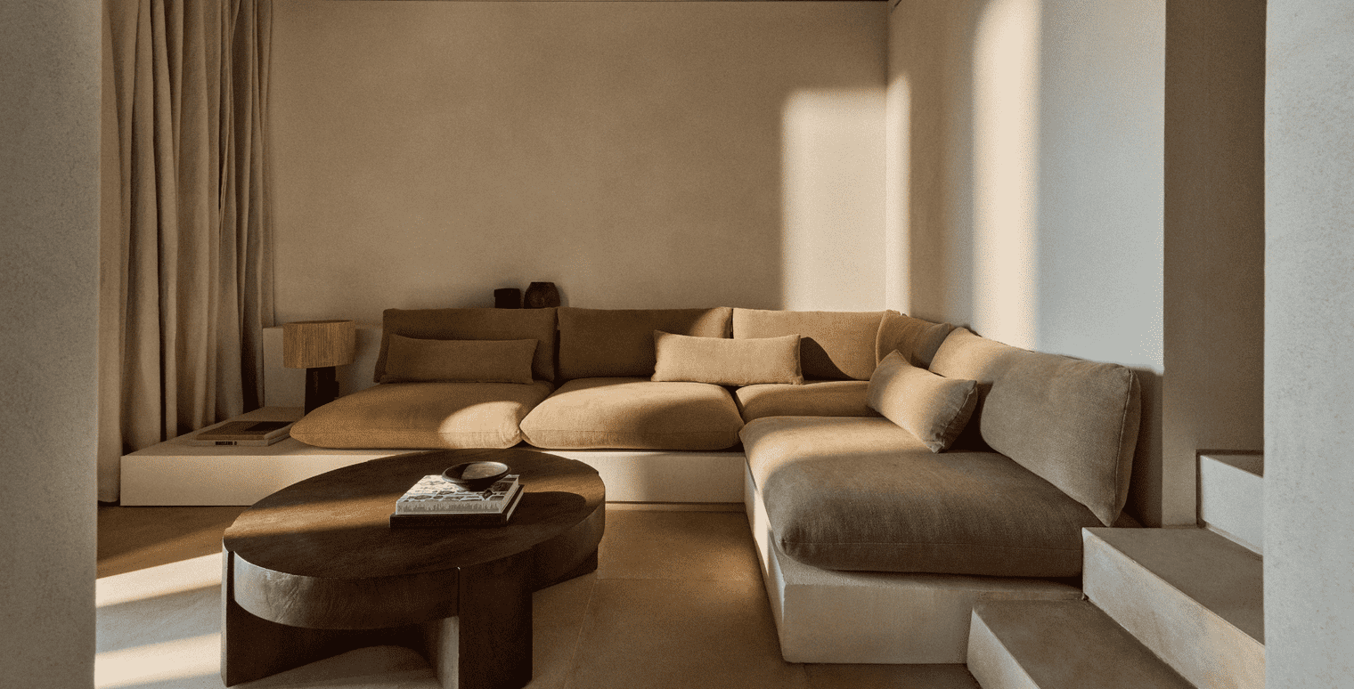 Separate living space in Suite with comfortable L shaped sunken sofa